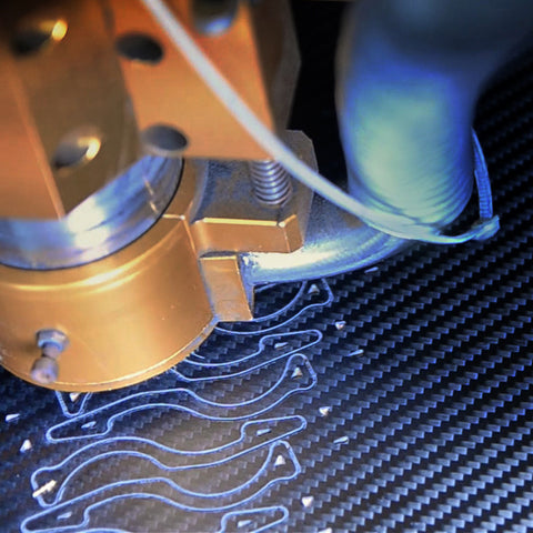 A high precision CNC machine cutting the components of the Pocket Tripod