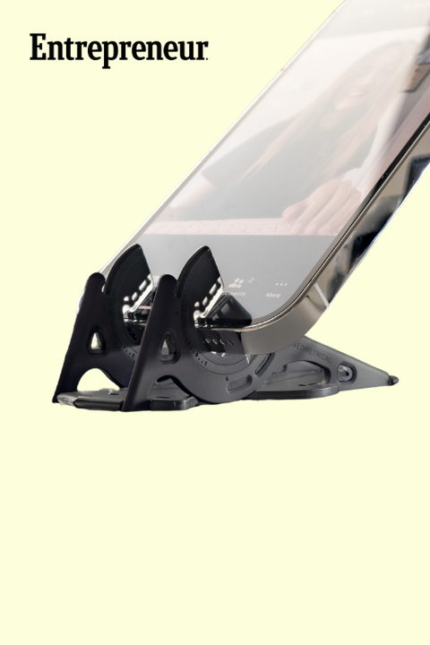 an iphone on a pocket tripod for a facetime call