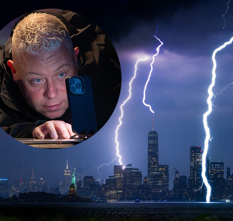 Dan Martland over manhattan skyline with lighting