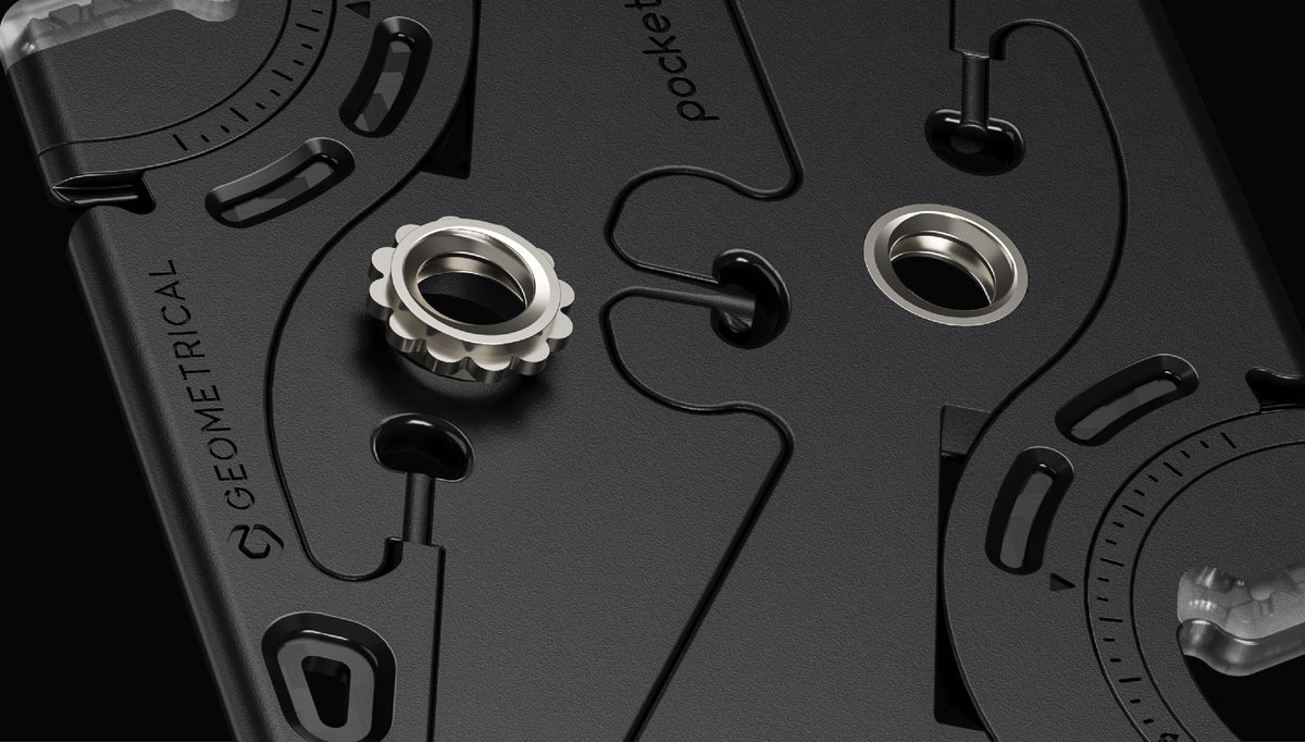 Two nickel-plated brass 1/4″-20 connectors embedded in the black bases