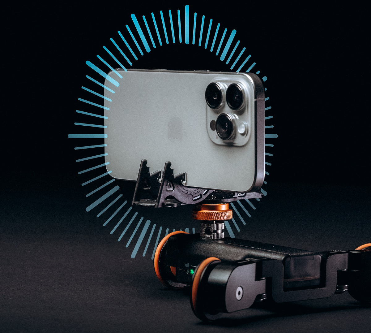 An iPhone Pro on the Pocket Tripod PROv2 mounted on a motorized camera slider