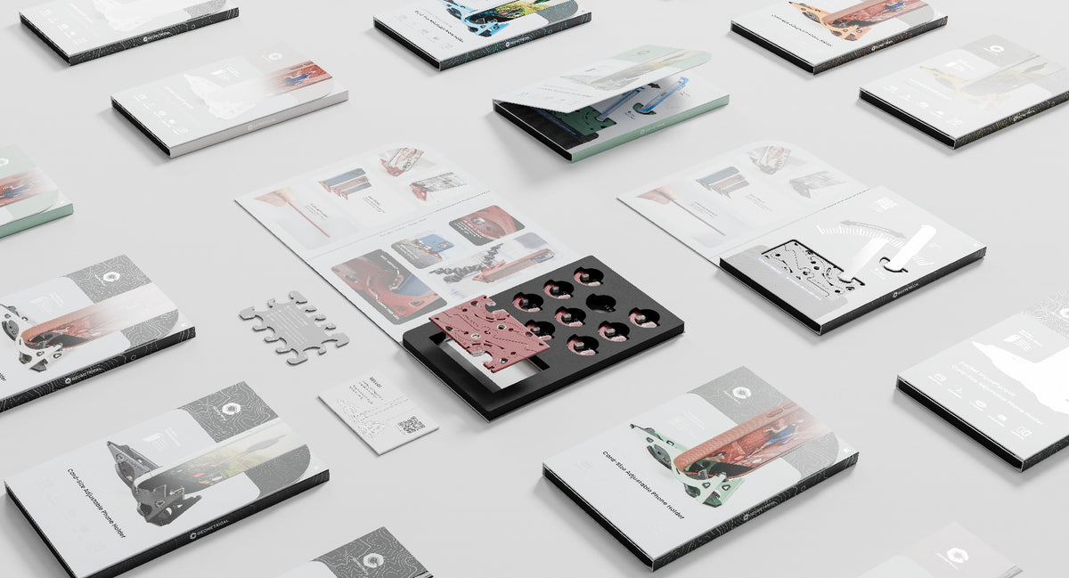 Flat lay of Pocket Tripod PROv2 packaging and printed inserts