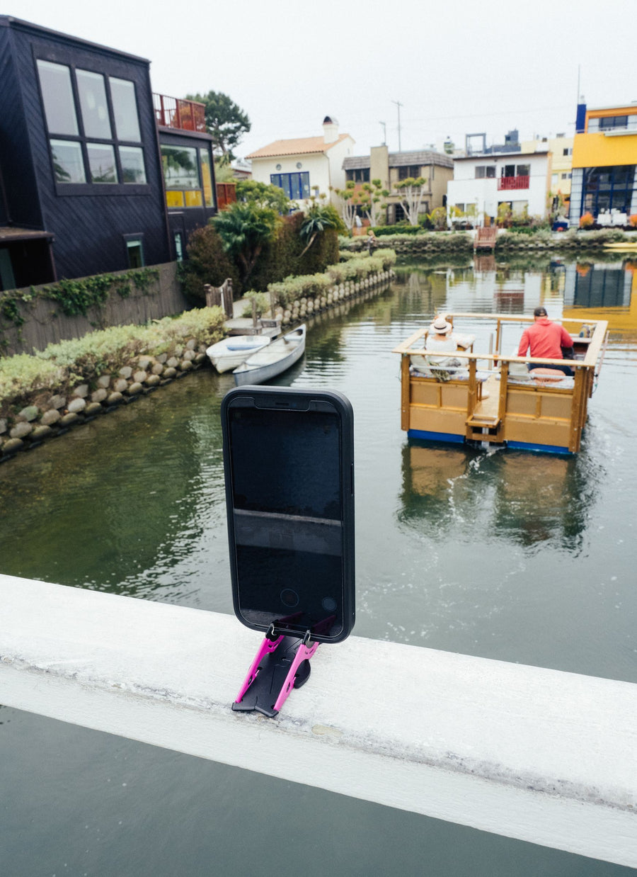 Phone on a harbour railing