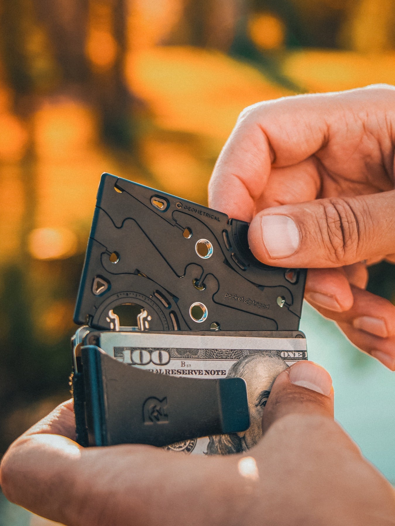 Pocket Tripod sliding into a wallet card slot