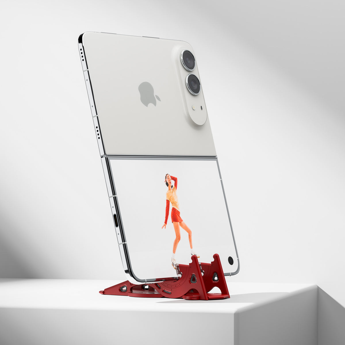 Pocket Tripod PROv2 holding an iPhone Duo
